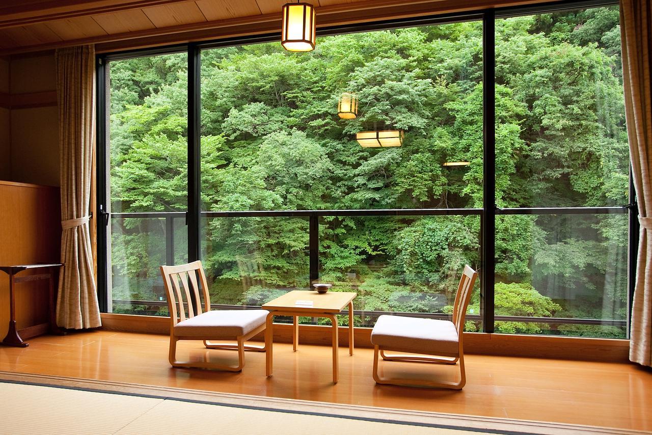 Готель Osawa Onsen Sansuikaku Ханамакі Номер фото